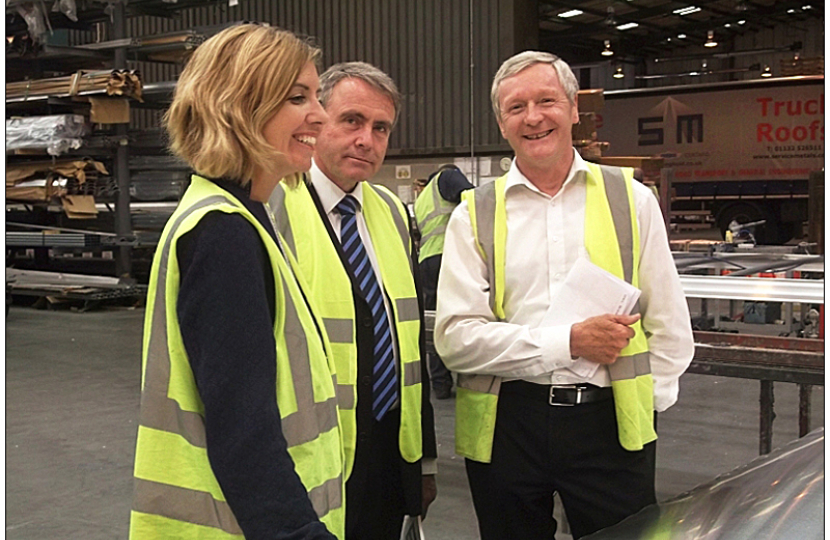 Picture of Andrea Jenkyns visiting a local manufacturing company