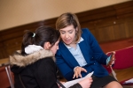 Andrea helping a jobseeker with her CV
