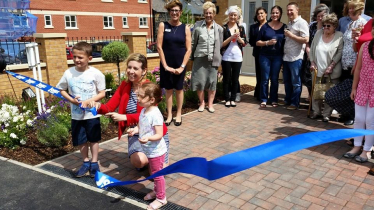 Andrea cuts the ribbon